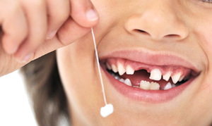 Как происходит смена молочных зубов